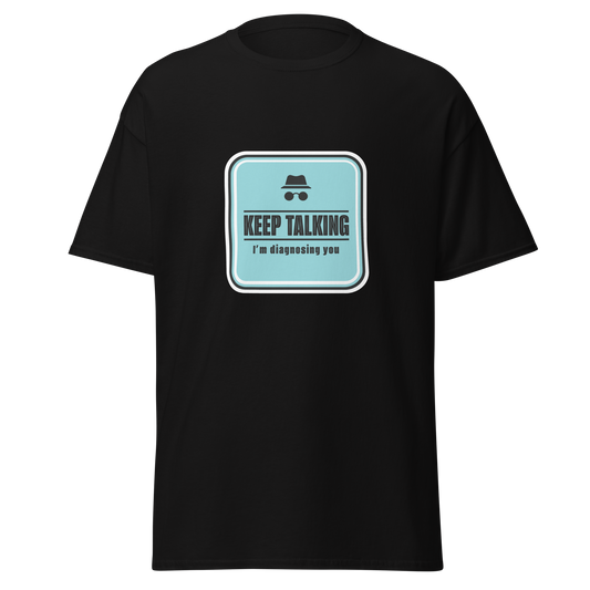 Unisex huumoripaita, musta. Edessä sininen kylttiprintti, jossa teksti "Keep talking I’m diagnosing you". Kielletään Kaikki labran printtimallisto.